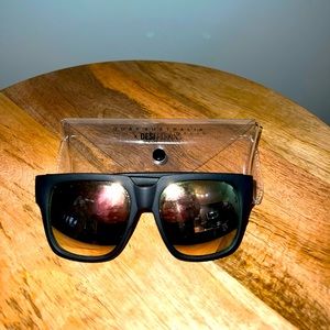 Matte black QUAY sunglasses.